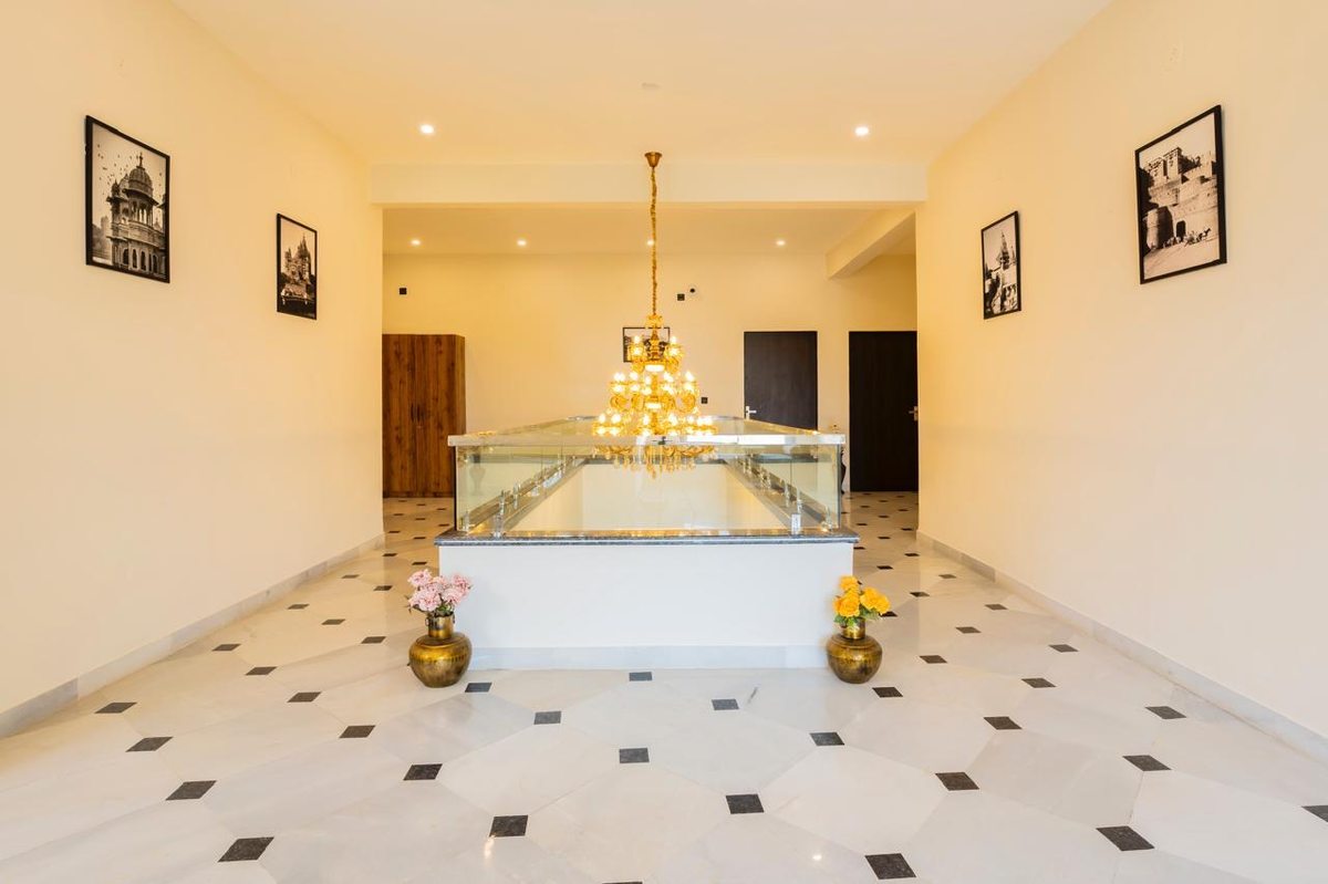 Heritage Lobby — Gold Chandelier